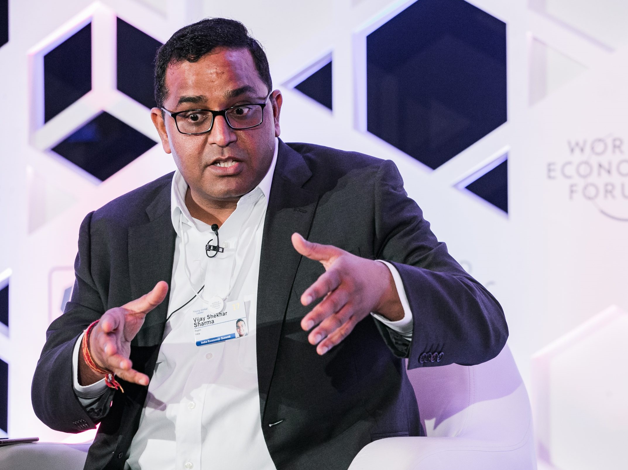 Vijay Shekhar Sharma reappointed Paytm chief, protest in Delhi, 50 dead in flood and landslides, SC to hear AIFF case and FPIs flood Indian markets